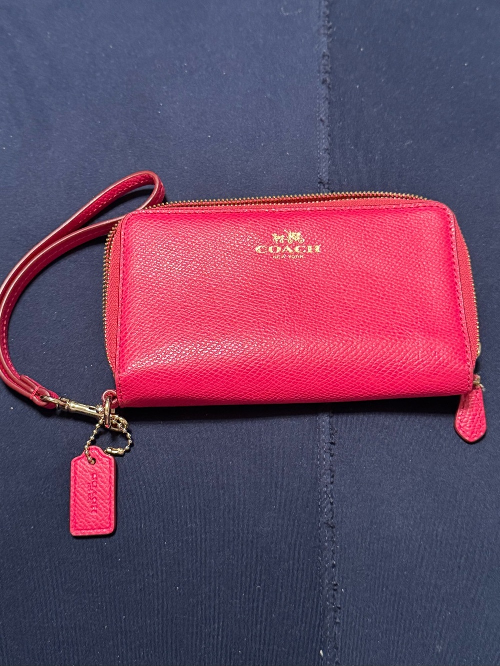 COACH Hot Pink Leather Wristlet with Gold Logo